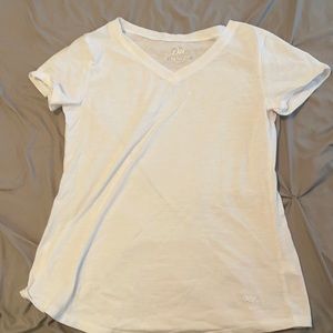 Justice Girls size 14/16. White v-neck T-shirt.